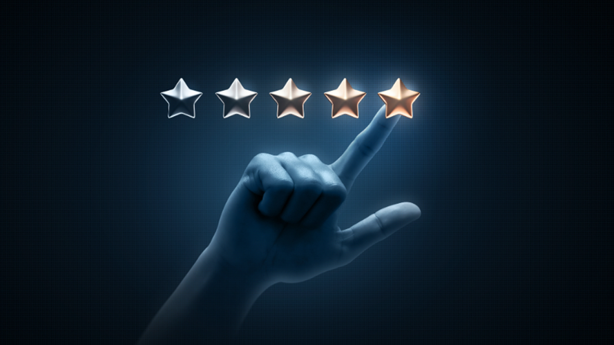 A graphic displaying five stars with a finger pointing to the brightest star, reflecting the ambition to be a premium brand
