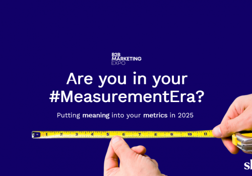 Measuring tool being used by person to measure words on image